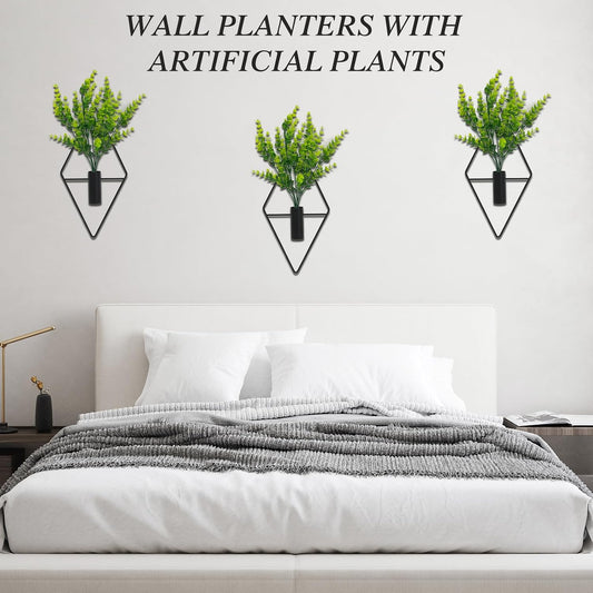 Set of 3 artificial eucalyptus wall planters on a wall